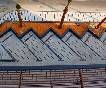 Patterned feature paving with palm planting at Manfath
